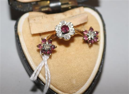 An 18ct gold, ruby and diamond ring and a pair of earrings.